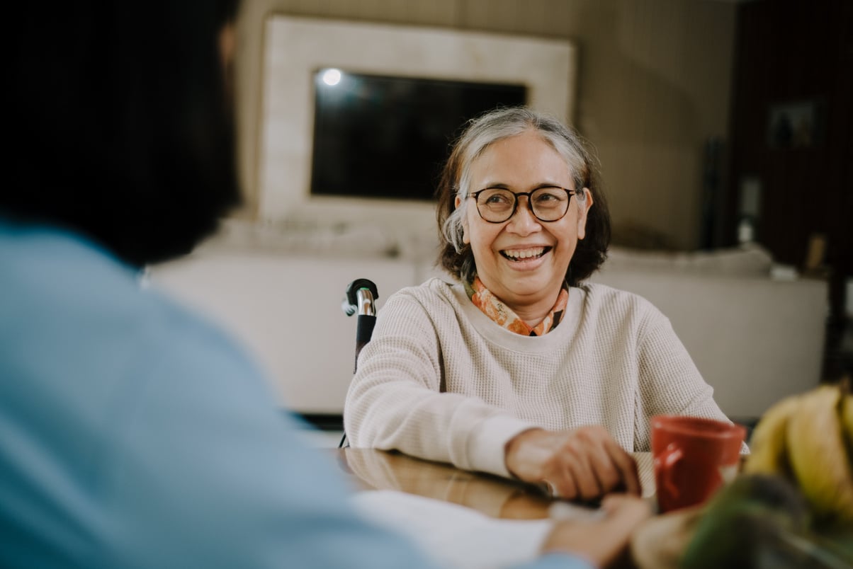 Happy Elderly Woman in a Nursing Home